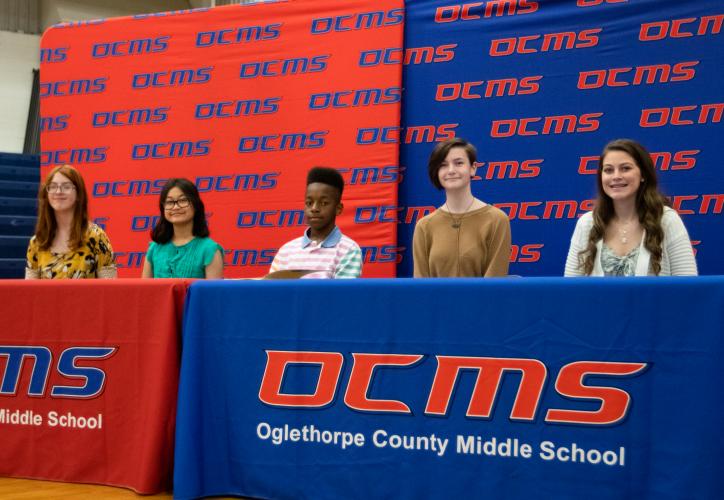 Oglethorpe County Middle School eighth-grade students Lyla Bryant, Ellen Hgay, Ermon Lewis, Devyn Patrick and Madison Rader are the recipients of the REACH scholarship. The REACH program provides a $10,000 scholarship for each selected student. (Photo/Sarah White)