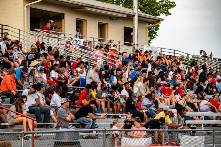 Supporters from the community and OCHS students line the bleachers during the spring game on May 20. Tickets were sold for $5. (Photo/Jack Casey)