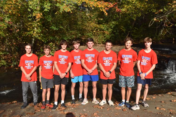The OCHS boys cross country team at the Carrollton Greenbelt trail on Thursday before the state championship.