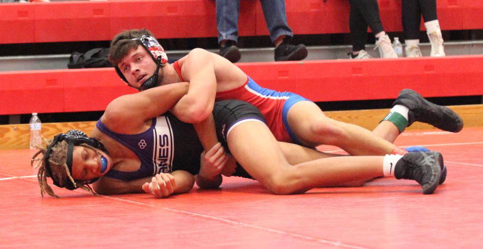 LT Faust grabs the advantage over a competitor at the North Oconee Duals this past weekend. Faust has returned from an ACL injury for his senior season. (DONNY FAUST/FOR THE OGLETHORPE ECHO)